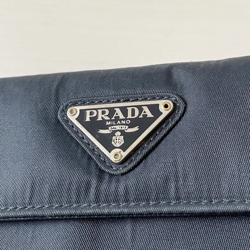 Prada navy blue Tessuto nylon triangle logo trifold medium snap wallet